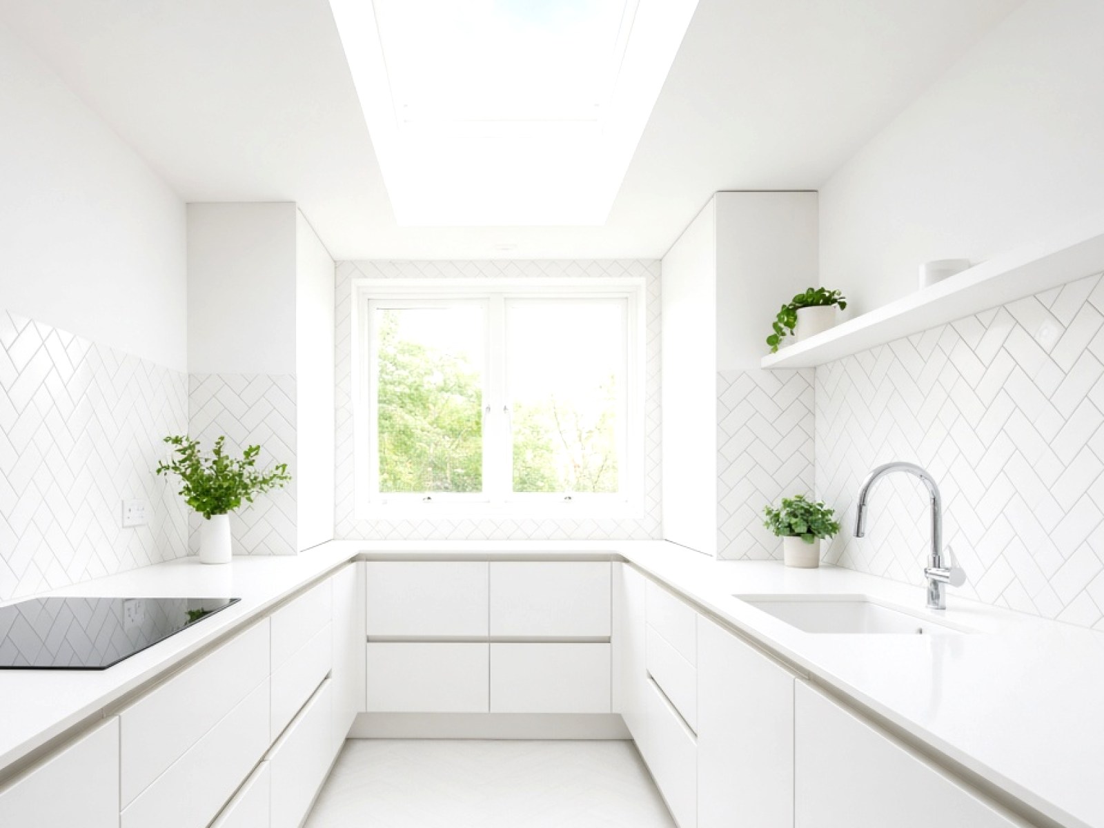Traditional kitchen with a fitted stone worktop
