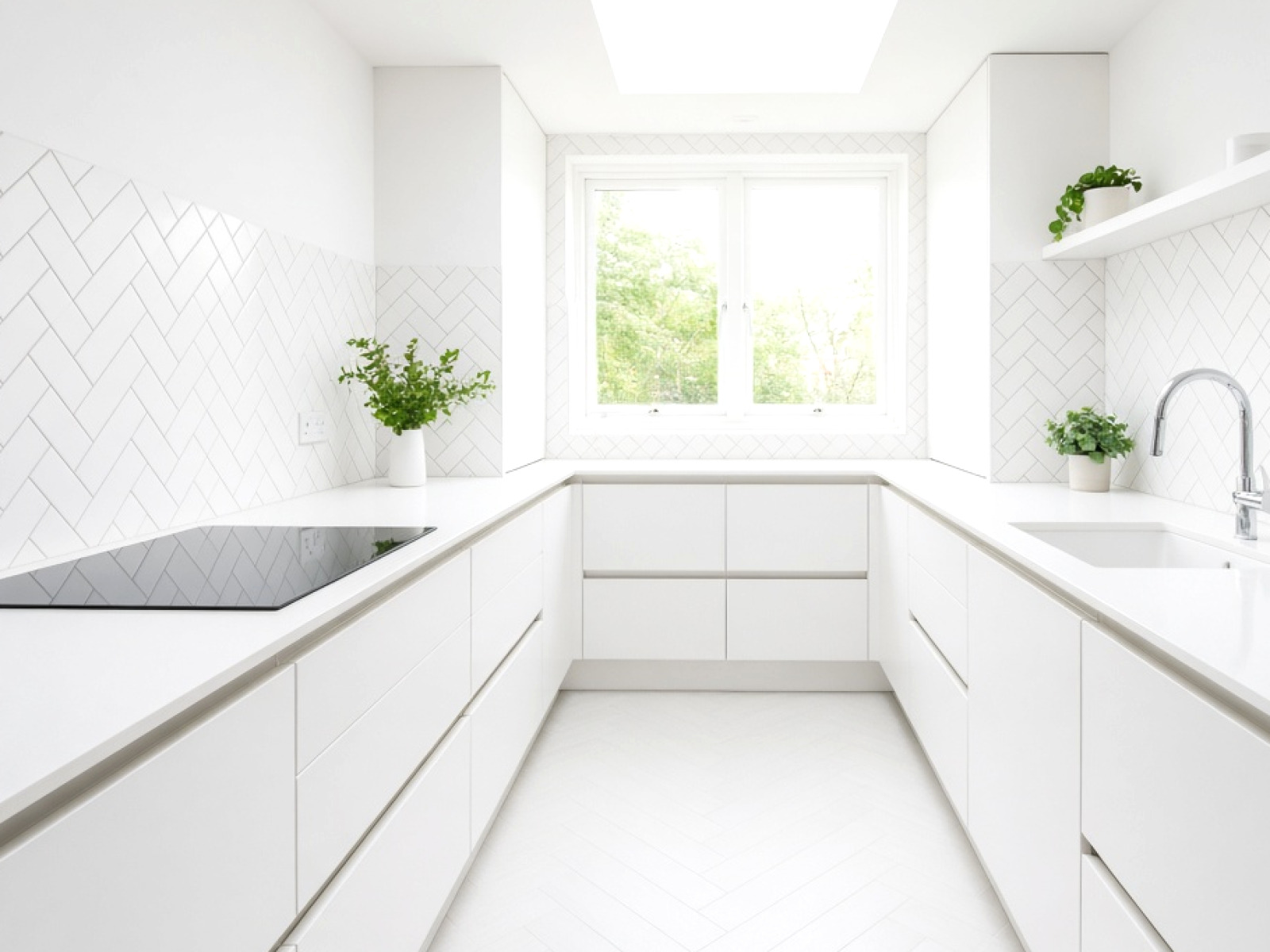 White marble-effect kitchen island fitted by Go Worktops
