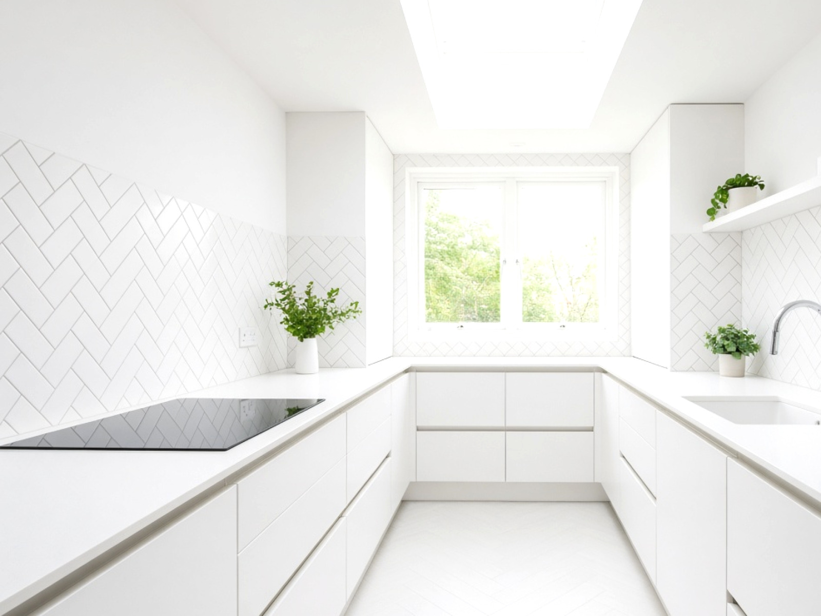 White Corinth Stone kitchen worktop on a contemporary island